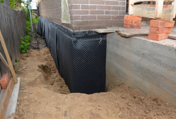 SJ Waterproofing Pros technician performing targeted Foundation Crack Repair assessment in Waynetown, IN